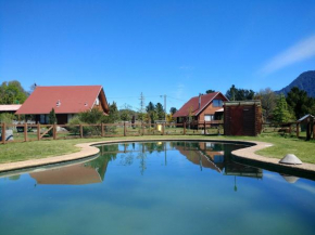 Гостиница Cabanas Tres Volcanes  Пукон